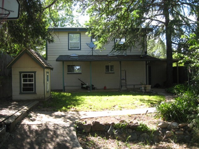 1417 Ridge Drive Redding, CA 96001 - Photo 12 of 24 Backyard looking at house
