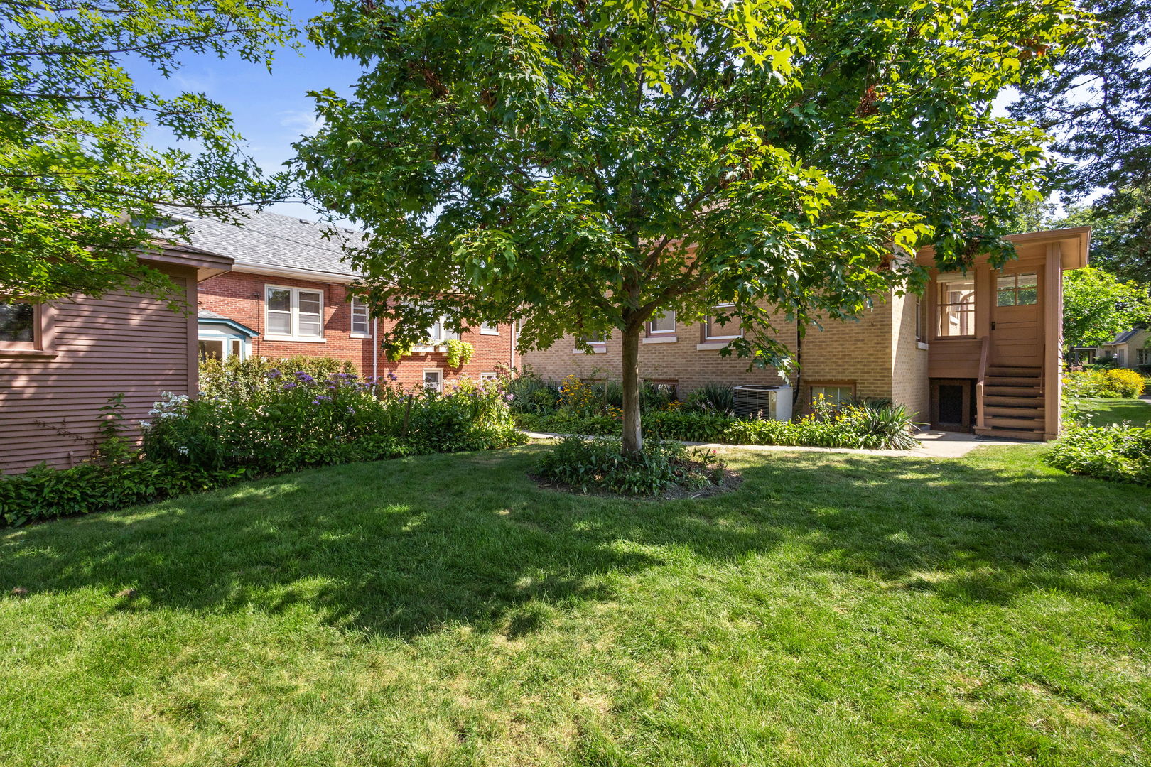 310 Bartram Road Riverside, IL 60546 - Photo 14 of 25 a view of a house with a yard