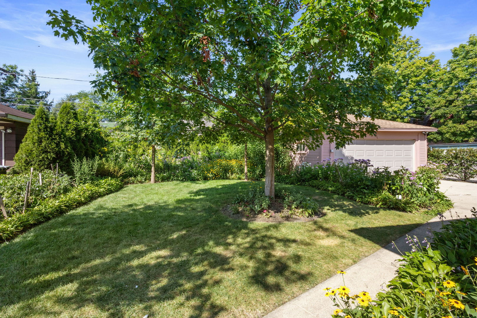 310 Bartram Road Riverside, IL 60546 - Photo 15 of 25 a backyard of a house with lots of green space