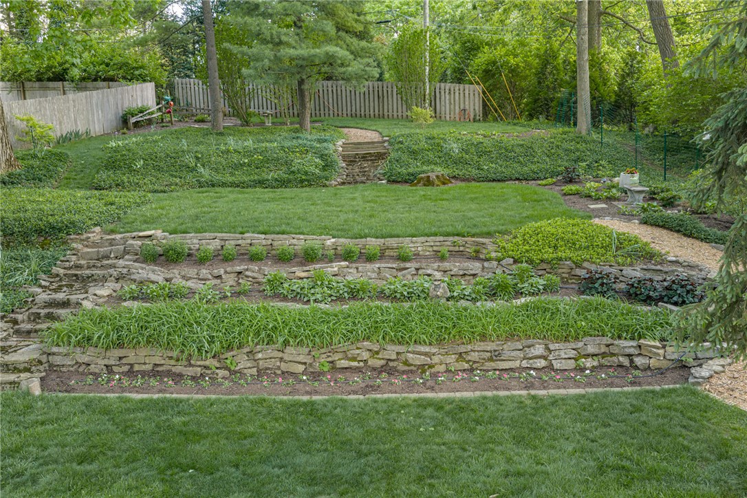 156 West Hadley Road Dayton, OH 45419 - Photo 66 of 71 This lush, multi-level yard features verdant lawns and charming stone retaining walls.