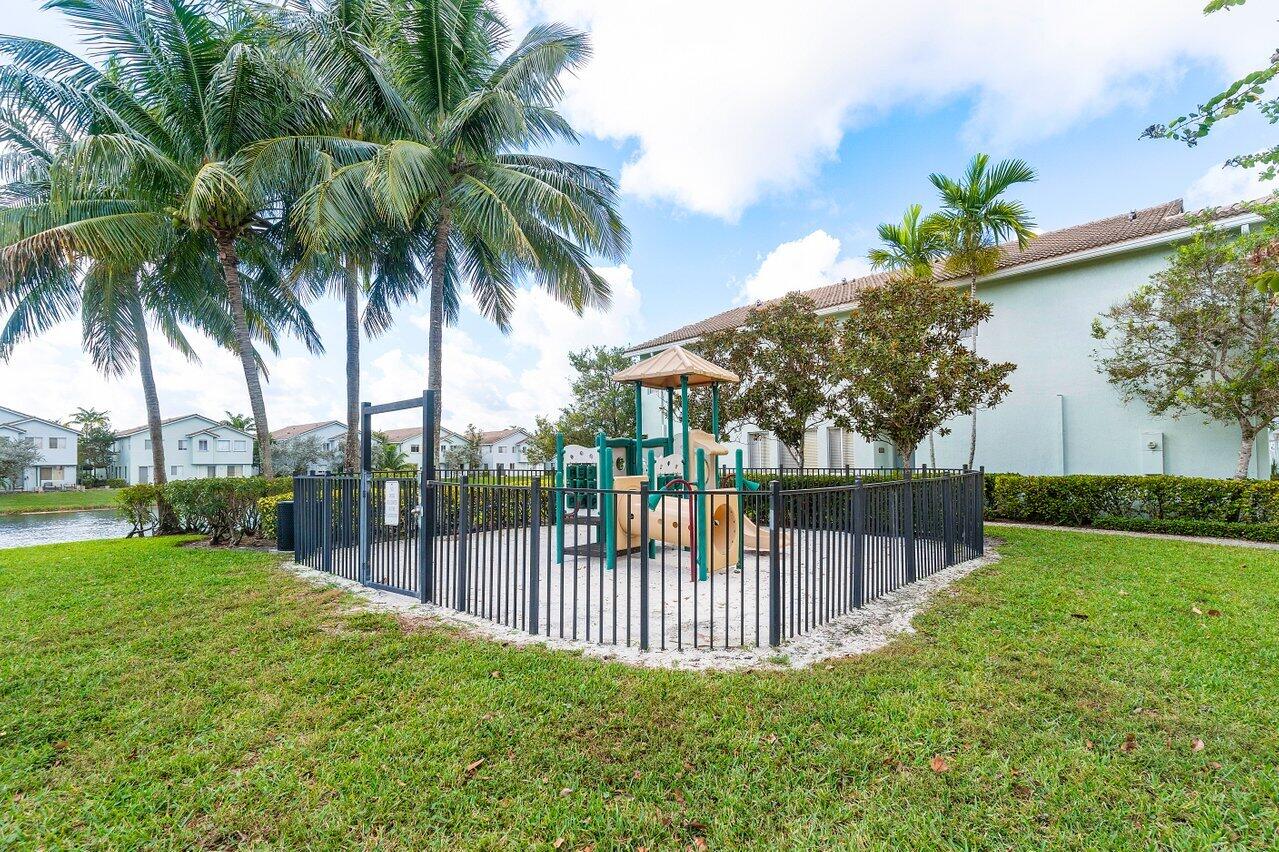 3266 Laurel Ridge Circle Riviera Beach, FL 33404 - Photo 22 of 34 Playground next door