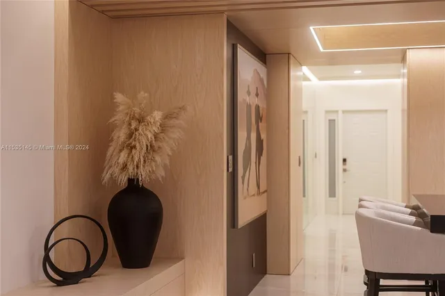 a view of a room with a potted plant