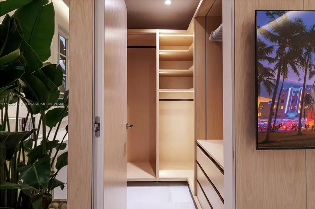 a spacious bathroom with a bathtub a sink and shower