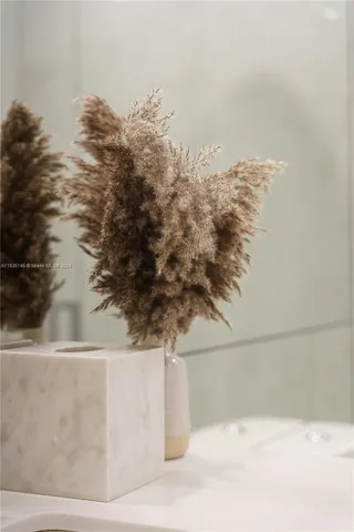 a view of a hallway with furniture and entryway