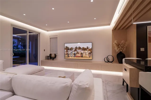 a living room with furniture and window