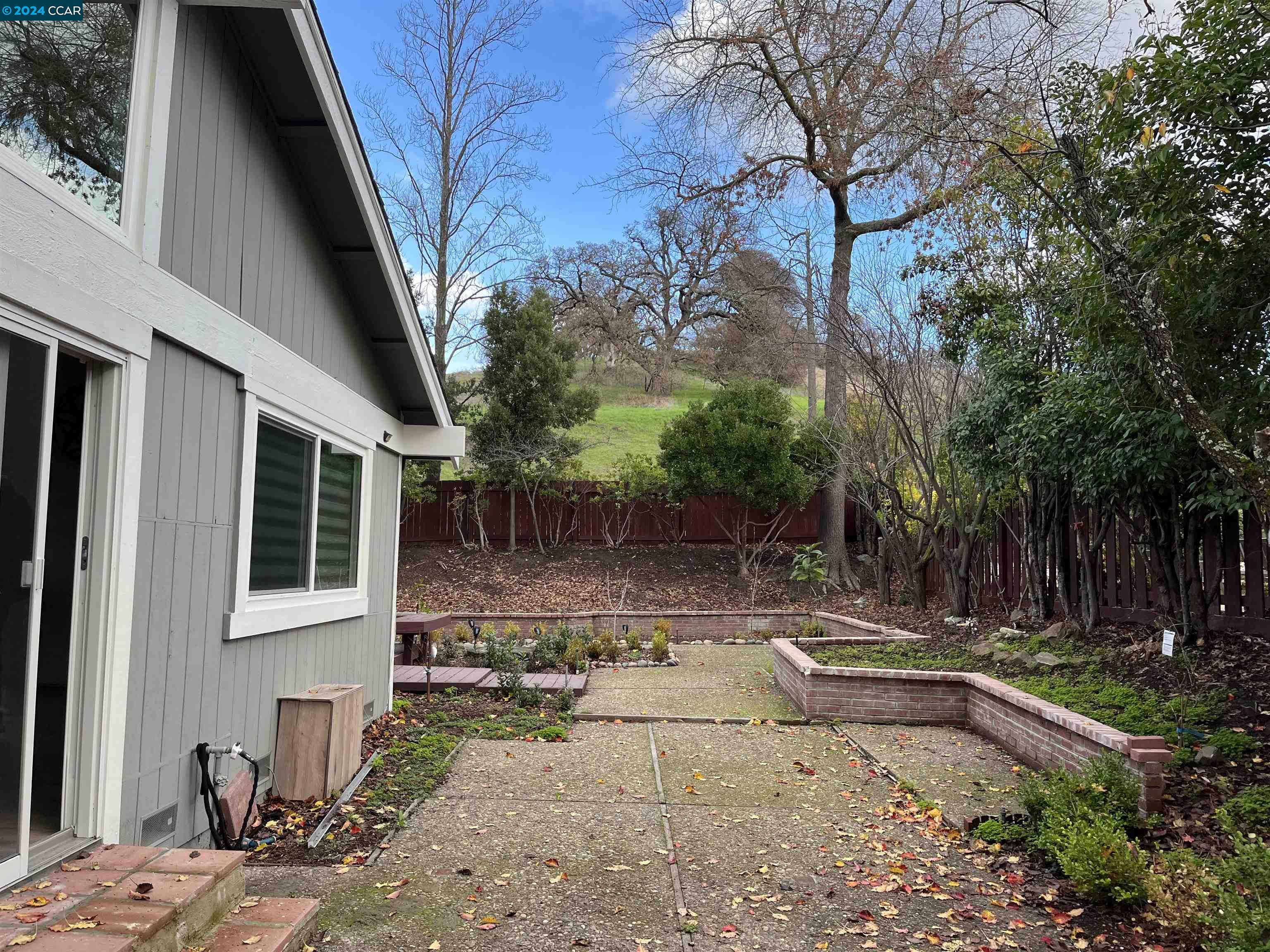 Glengarry Drive Walnut Creek, CA 94596 - Photo 21 of 21 a view of a backyard with a tree
