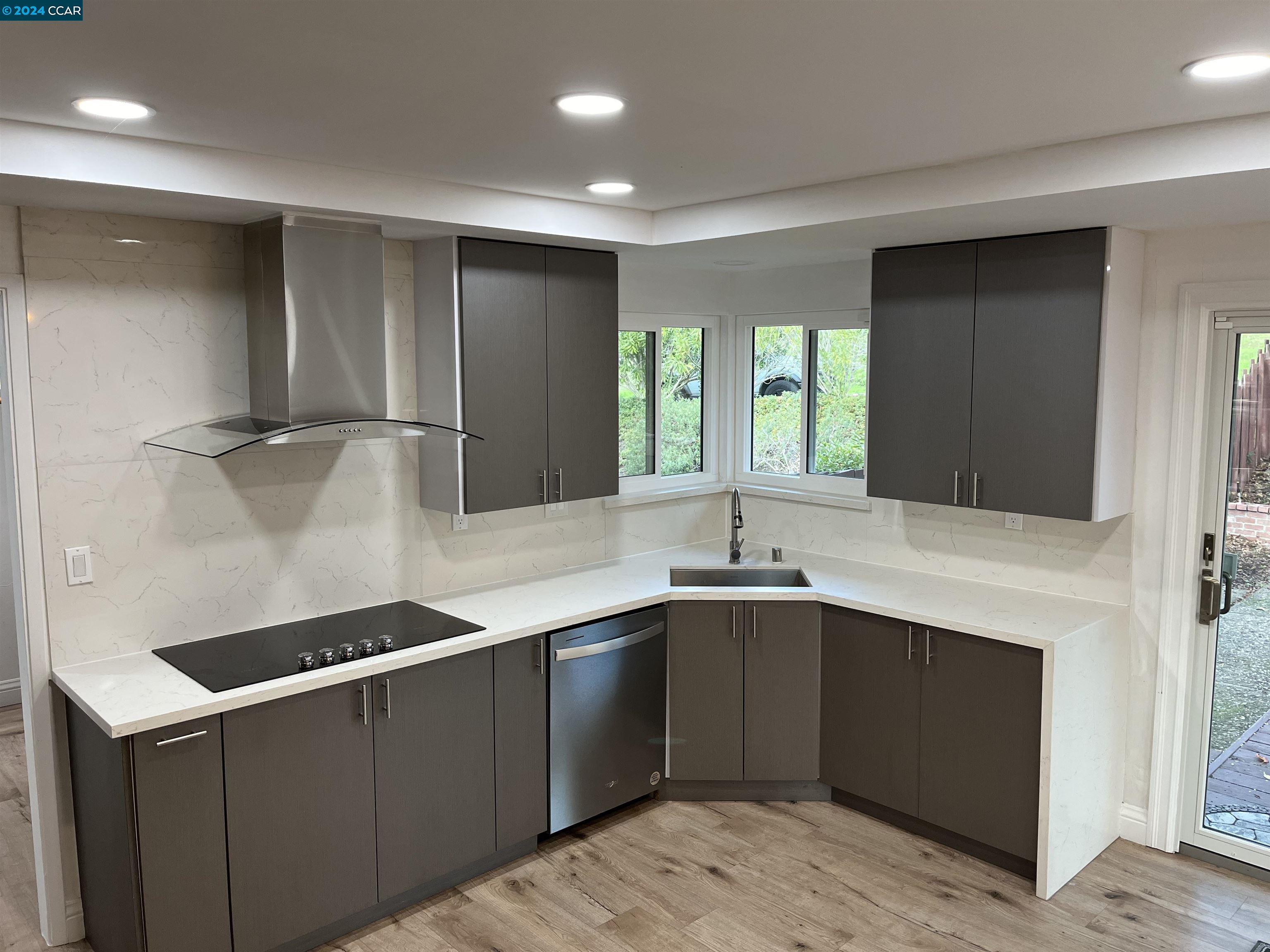 Glengarry Drive Walnut Creek, CA 94596 - Photo 5 of 21 a kitchen with a sink and cabinets