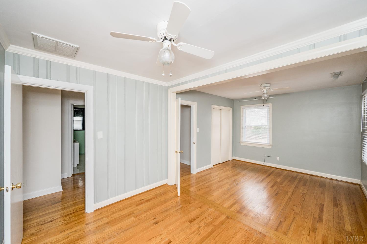 4925 Old Boonsboro Road Lynchburg, VA 24503 - Photo 25 of 57 a view of an empty room with wooden floor and a window