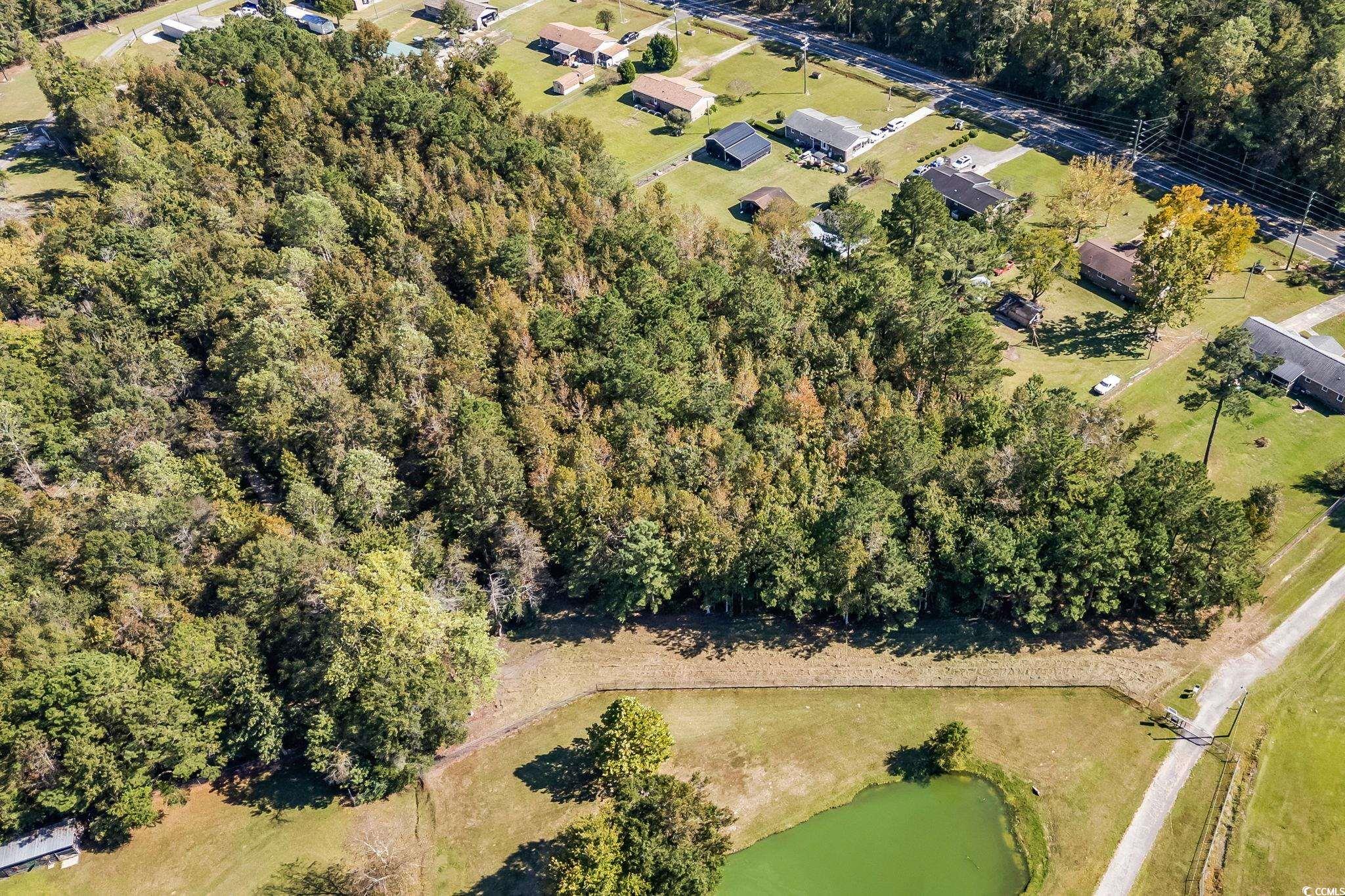 472 Highway 472 Conway, SC 29526 - Photo 15 of 30 Aerial view of property and surrounding area featuring a nearby body of water