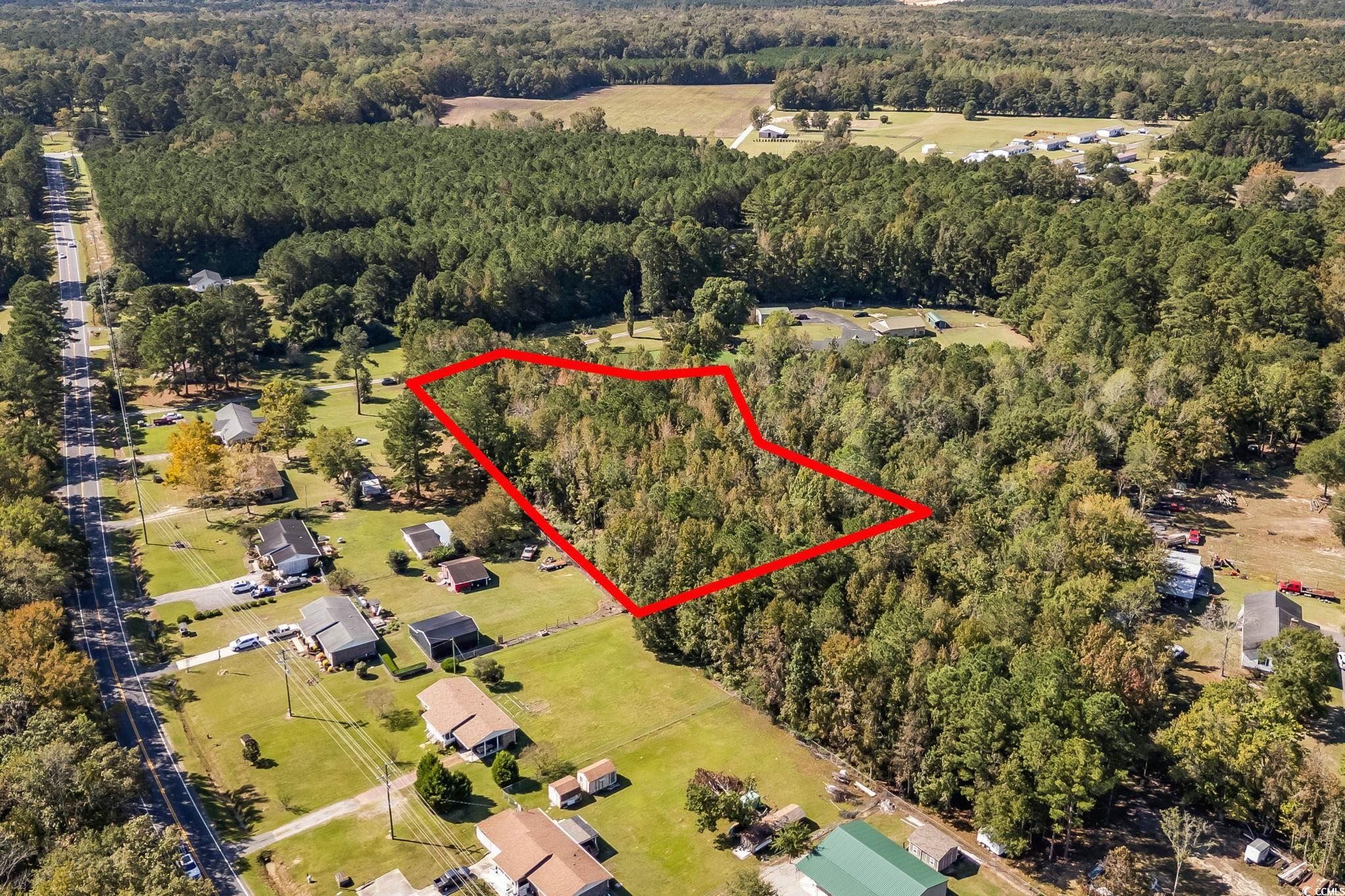 472 Highway 472 Conway, SC 29526 - Photo 20 of 30 Aerial view of property and surrounding area featuring a heavily wooded area and property parcel outlined