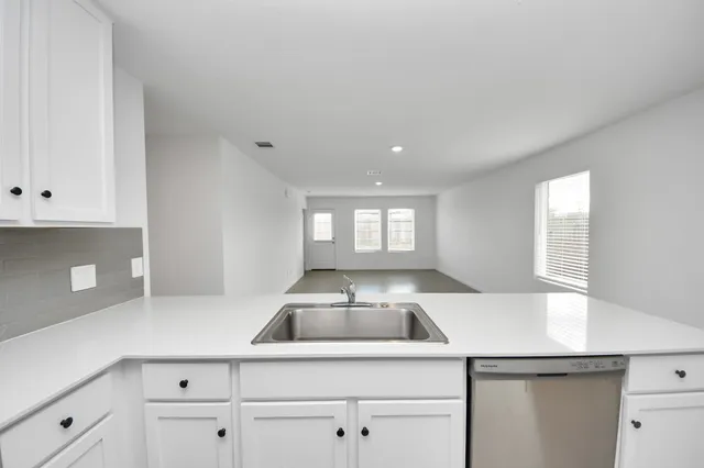 an empty room with windows