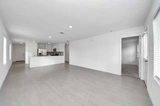 a view of a kitchen with a sink cabinets and a window