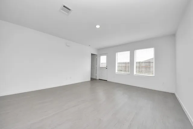 an empty room with windows