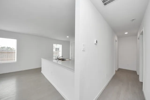 a view of hallway with stairs