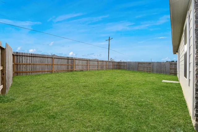 a view of a hallway with an empty room