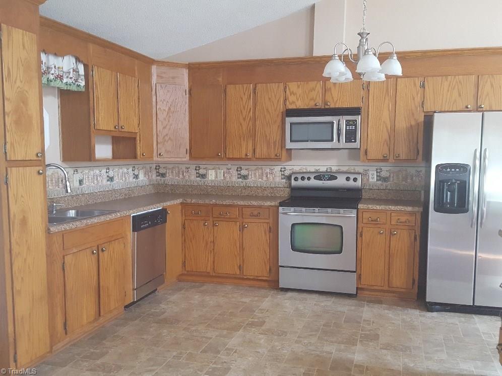 1055 Riverview Rd Extension Lexington, NC 27292 - Photo 2 of 27 Beautiful large kitchen with oak cabinets, all appliances remain.