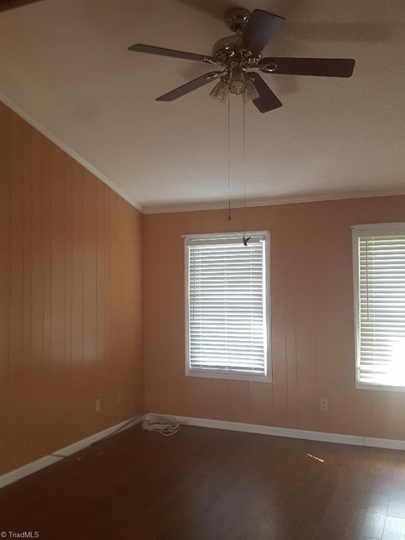 1055 Riverview Rd Extension Lexington, NC 27292 - Photo 25 of 27 Master bedroom with cathedral ceiling and ceiling fan.