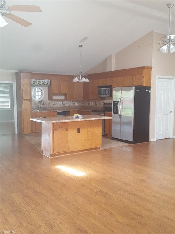 1055 Riverview Rd Extension Lexington, NC 27292 - Photo 26 of 27 Kitchen with island. Solid oak cabinets.