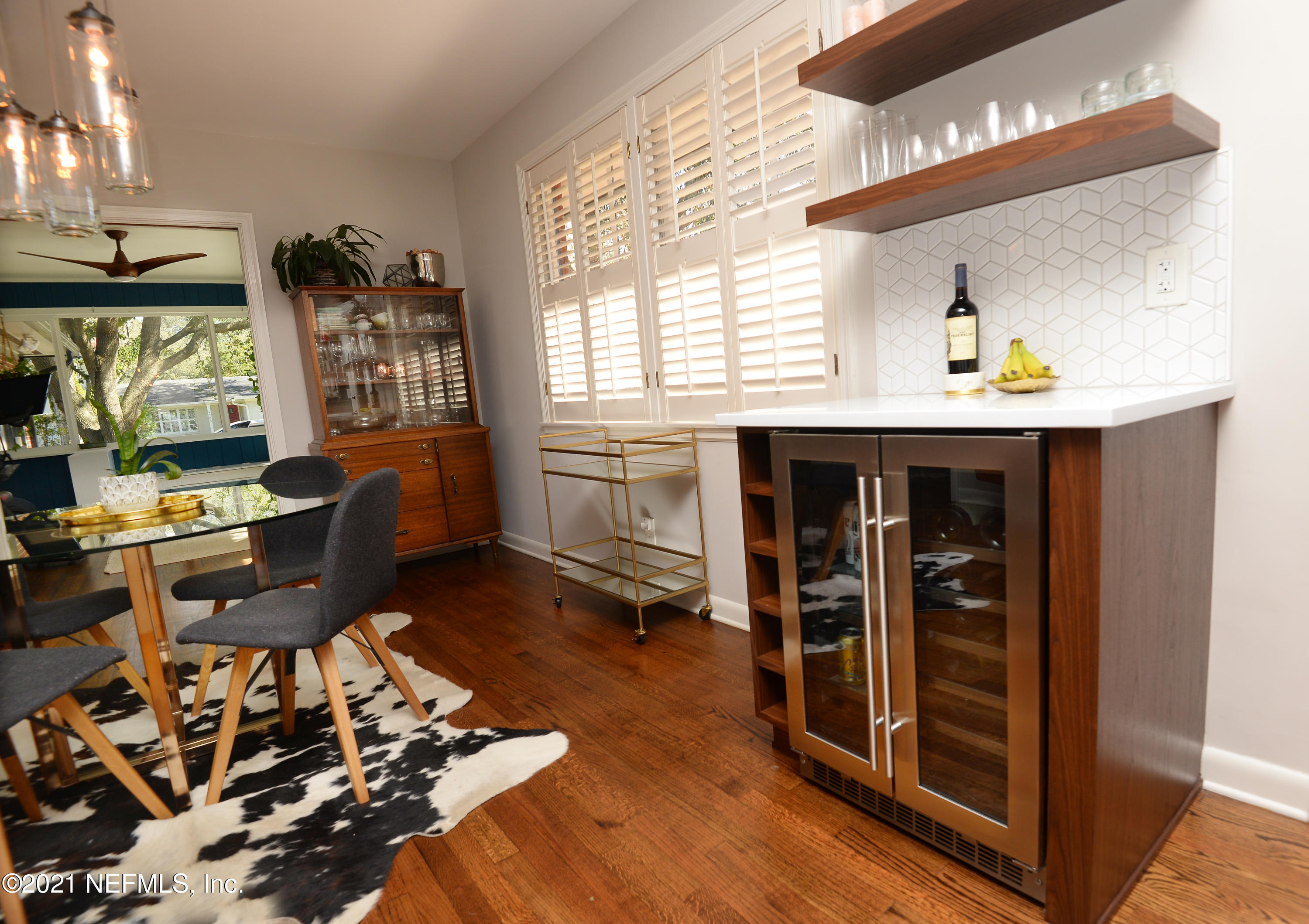 4722 Eton Lane Jacksonville, FL 32210 - Photo 13 of 43 Beverage Cooler and Dining Area View