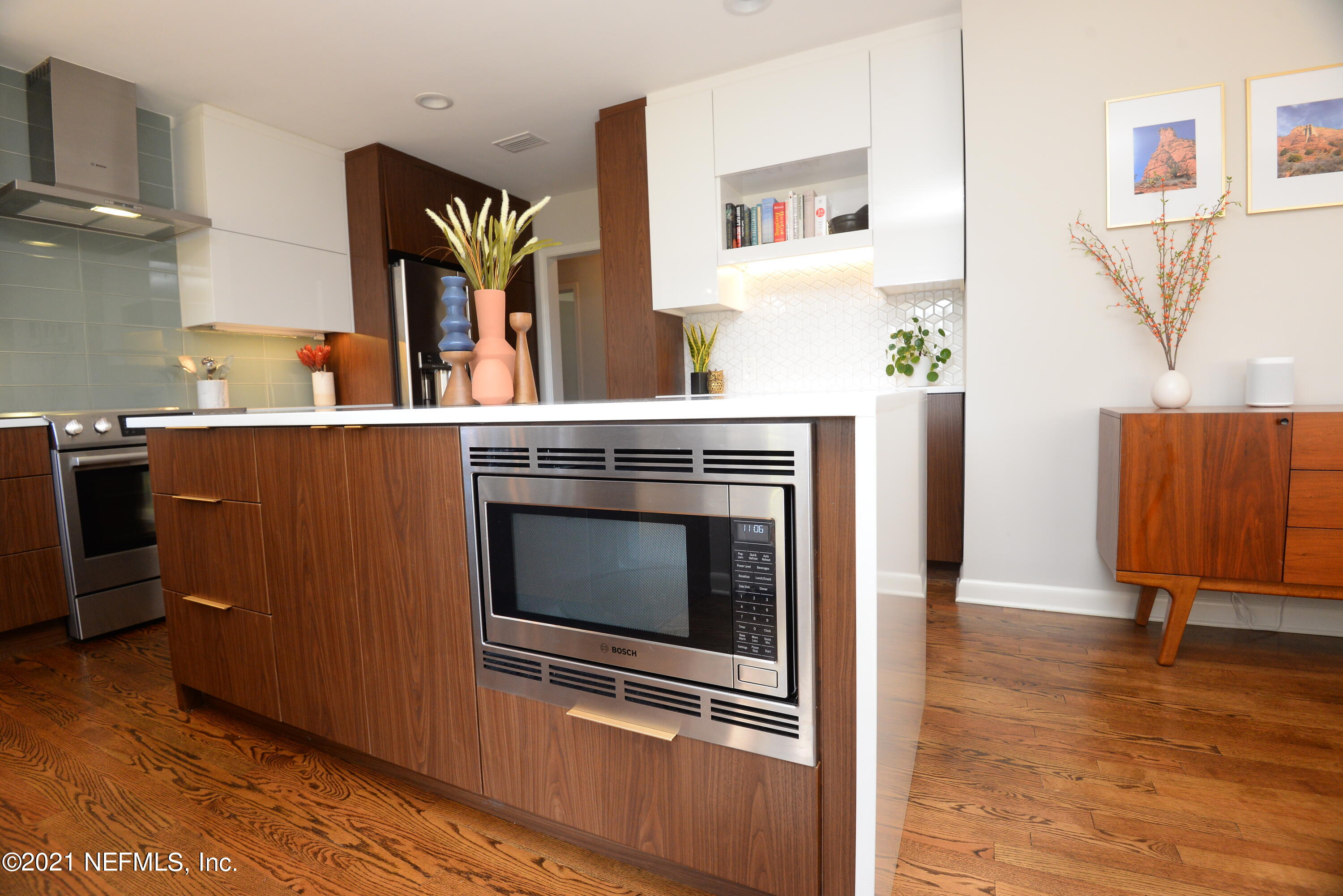 4722 Eton Lane Jacksonville, FL 32210 - Photo 21 of 43 Kitchen Island and Microwave View