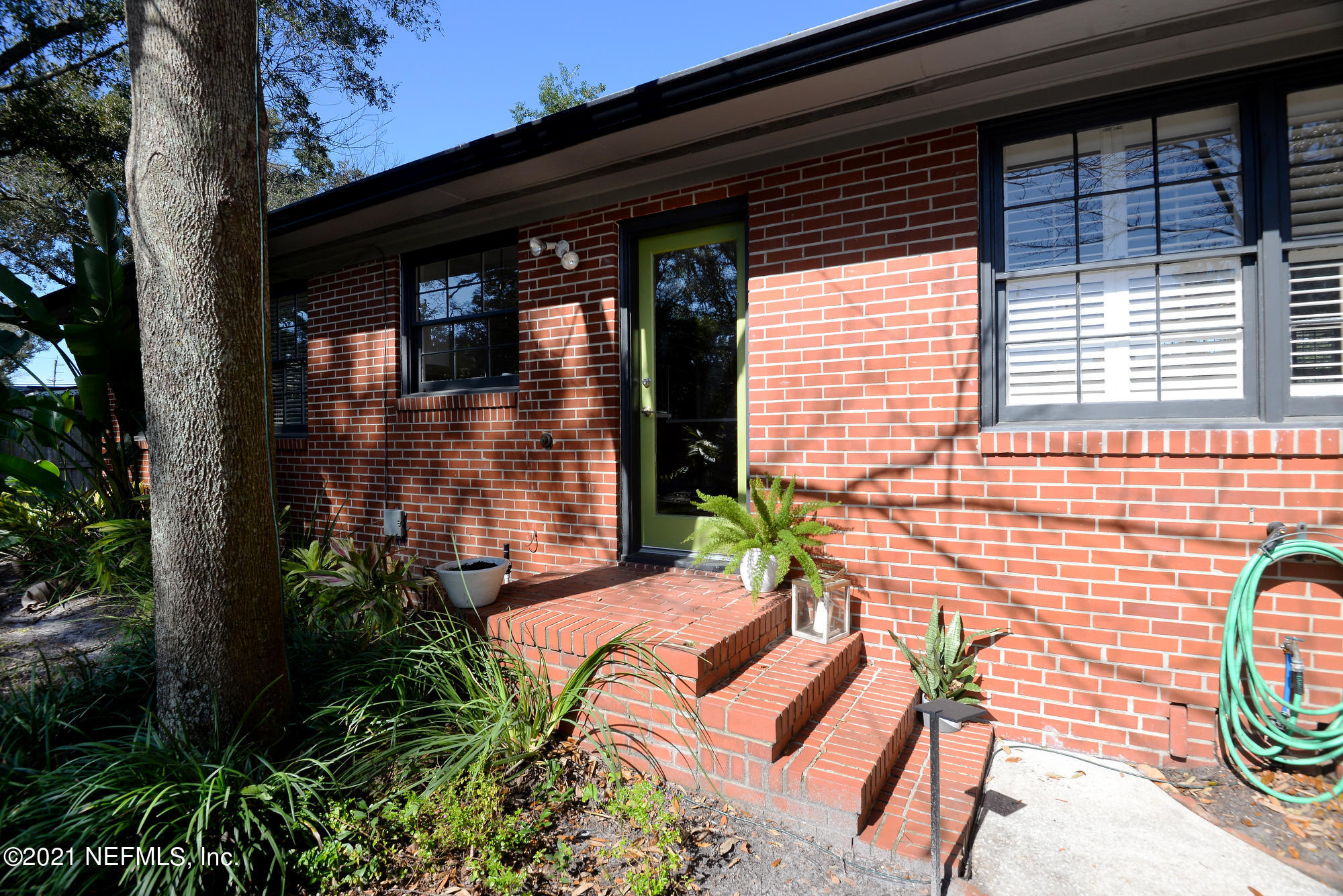 4722 Eton Lane Jacksonville, FL 32210 - Photo 41 of 43 Back Door to Kitchen Entry with Steps Vi