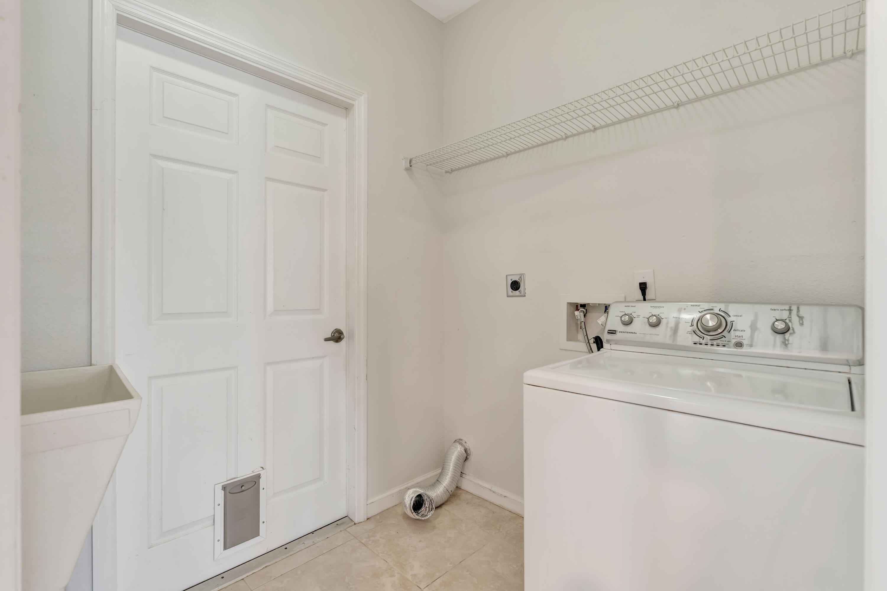 2320 Southwest Madrid Road Port St. Lucie, FL 34953 - Photo 45 of 46 Laundry Room