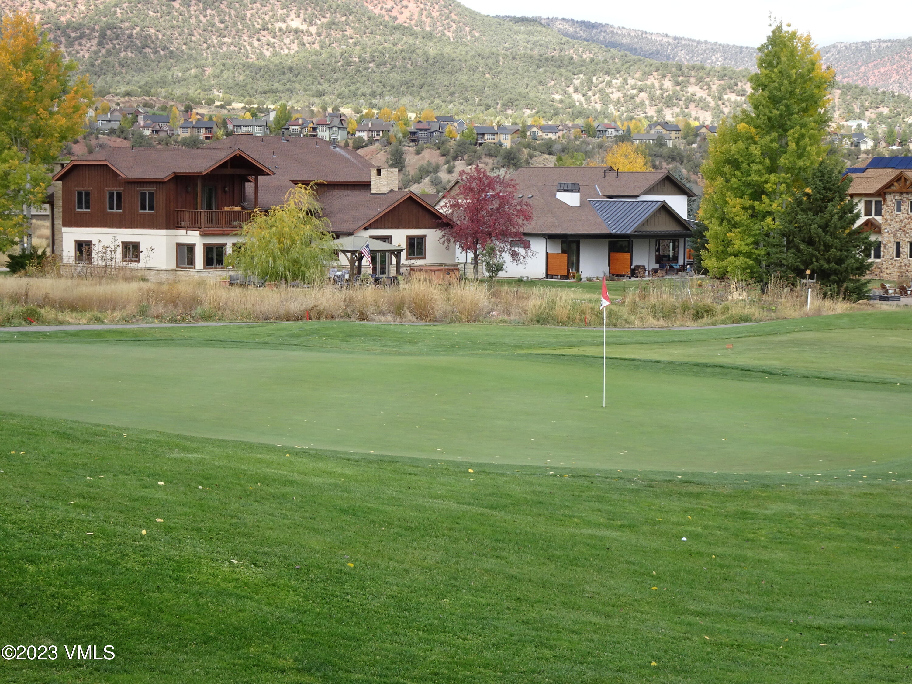 230 Timberwolf Gypsum, CO 81637 - Photo 14 of 34 a front view of a house with a big yard