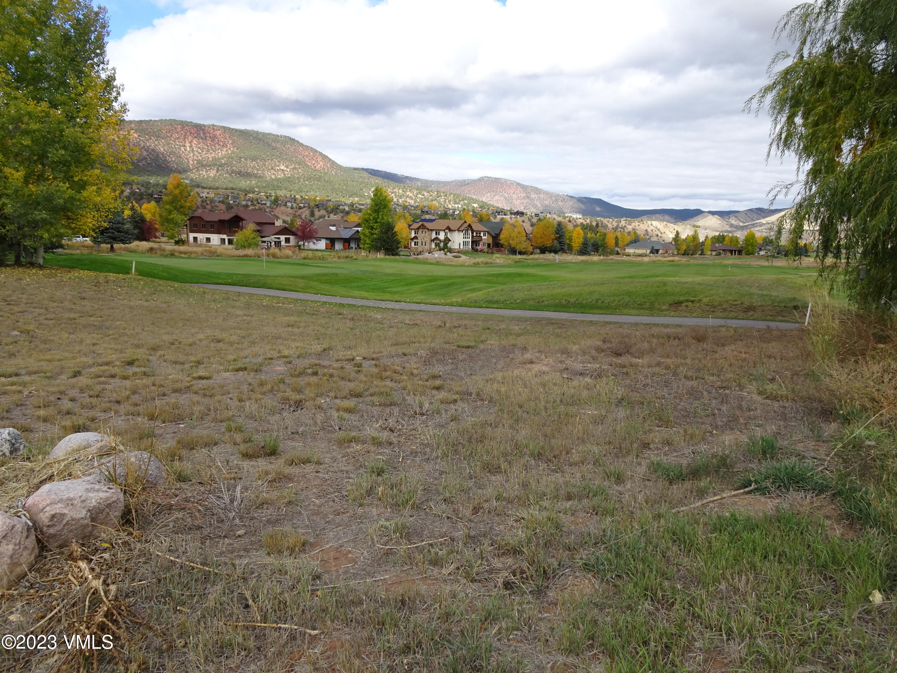 230 Timberwolf Gypsum, CO 81637 - Photo 16 of 34 a view of a lake with houses in the background