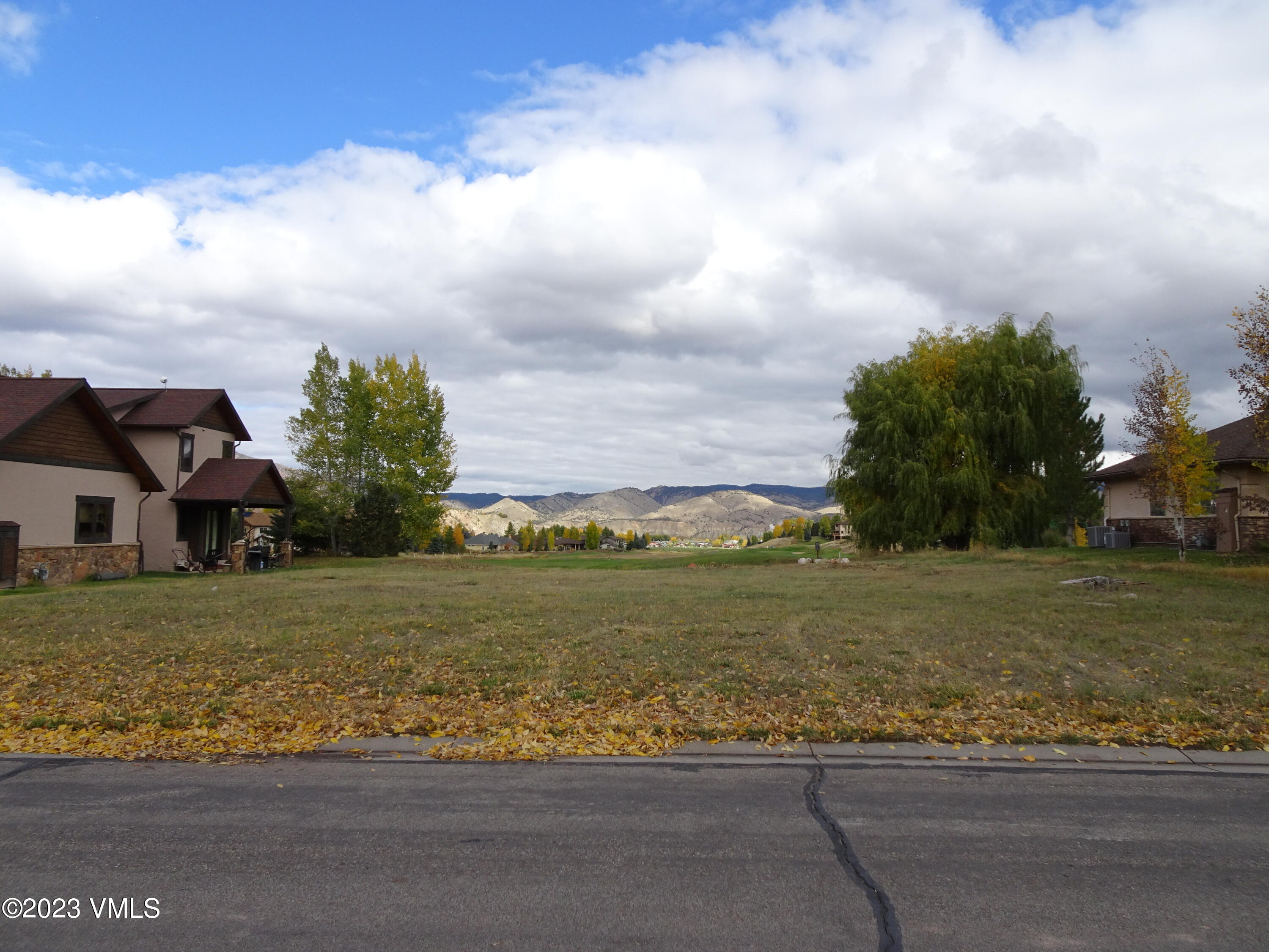 230 Timberwolf Gypsum, CO 81637 - Photo 3 of 34 a view of a big yard with a house