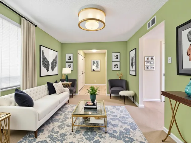 a view of a house with a yard and plants