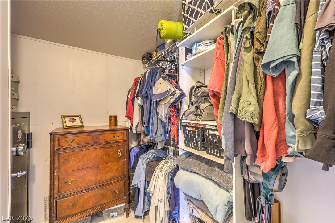 348 Tres Palomas Street Overton, NV 89040 - Photo 22 of 41 Streamlined organization for your wardrobe within this convenient walk-in closet.