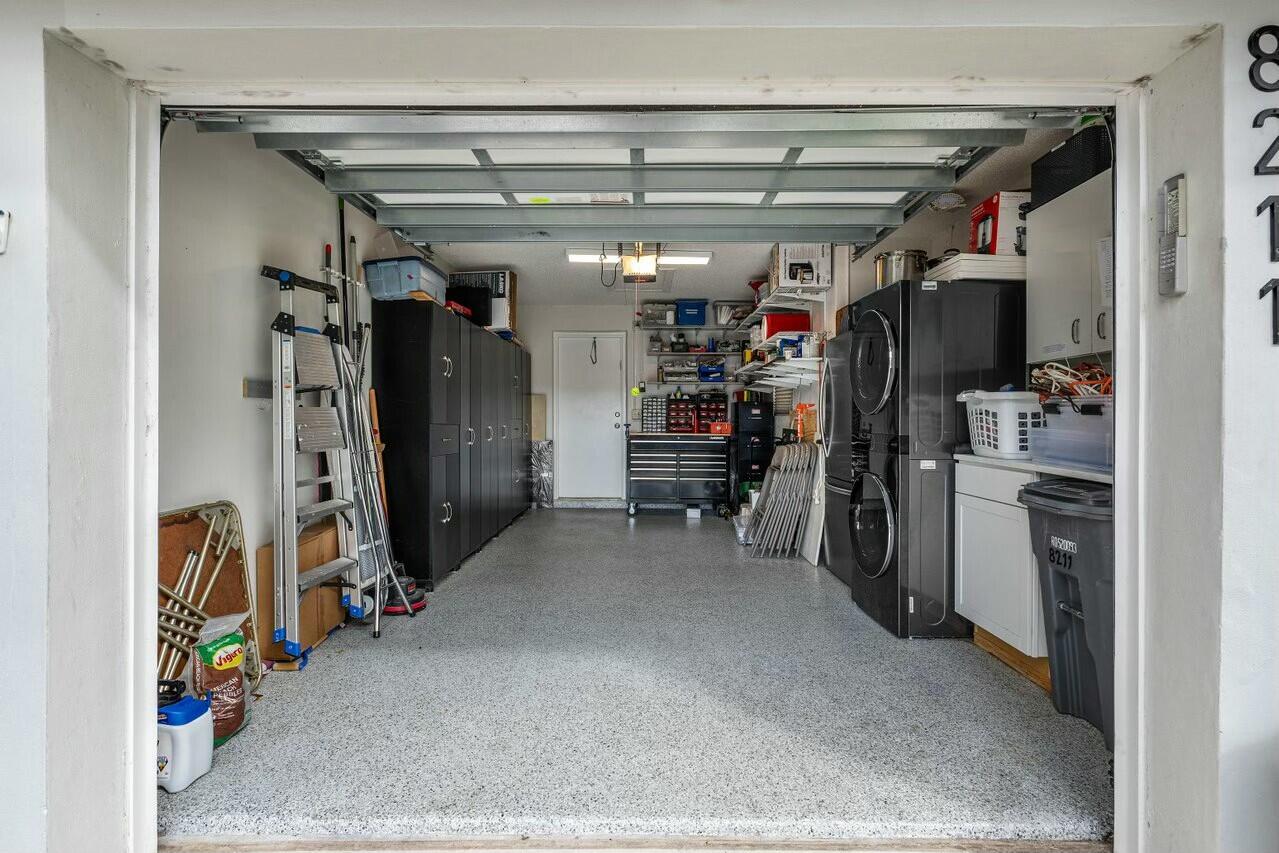 8211 Springlake Drive Boca Raton, FL 33496 - Photo 30 of 49 a view of a room with gym equipment