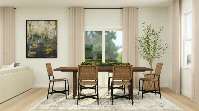 a view of a dining room with furniture and window