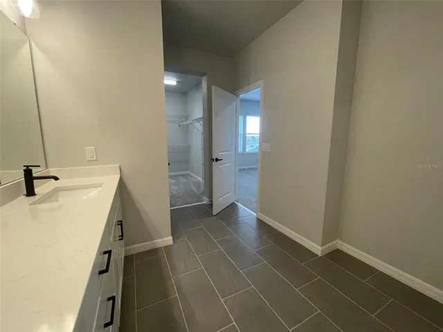 a view of a kitchen with a sink