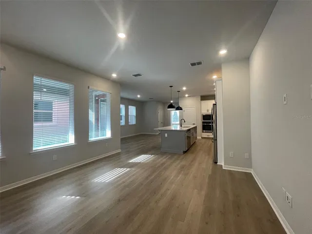 a view of kitchen and windows