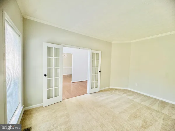 an empty room with a natural light
