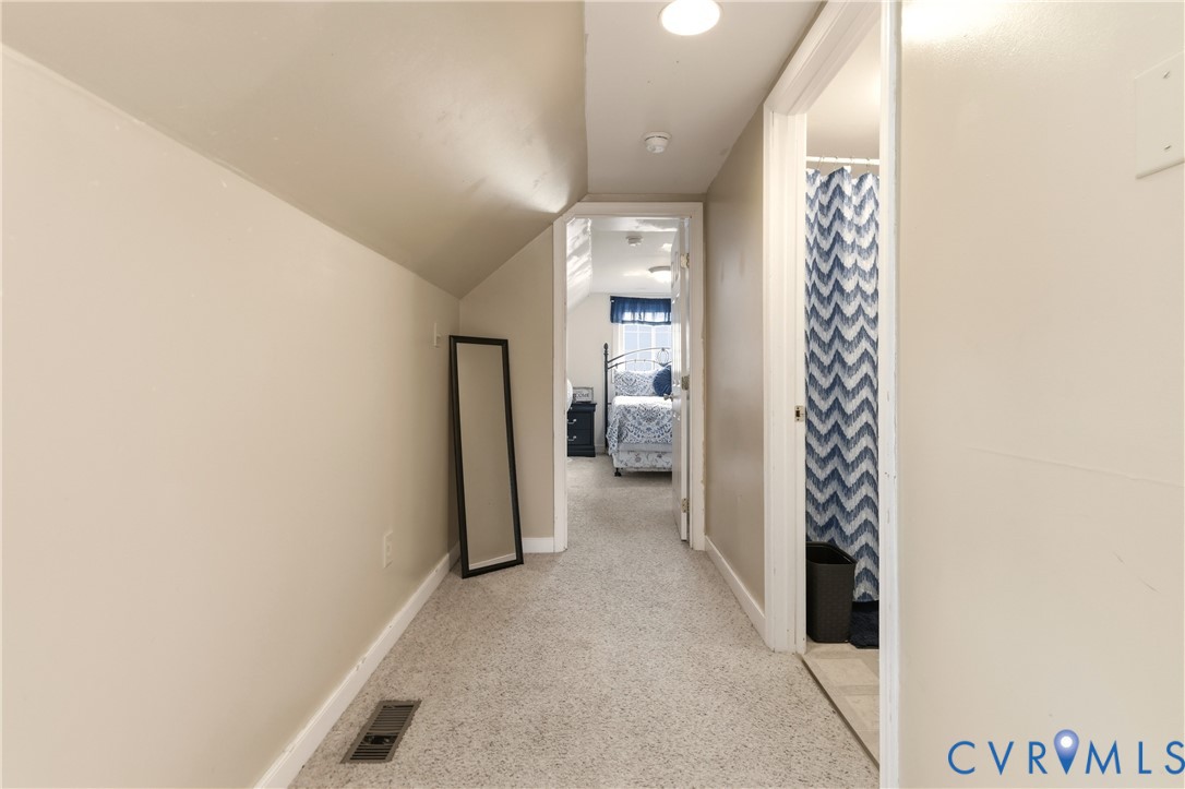 1311 Williamsburg Road Richmond, VA 23231 - Photo 27 of 38 Hallway featuring sloped ceilings, recessed lighti
