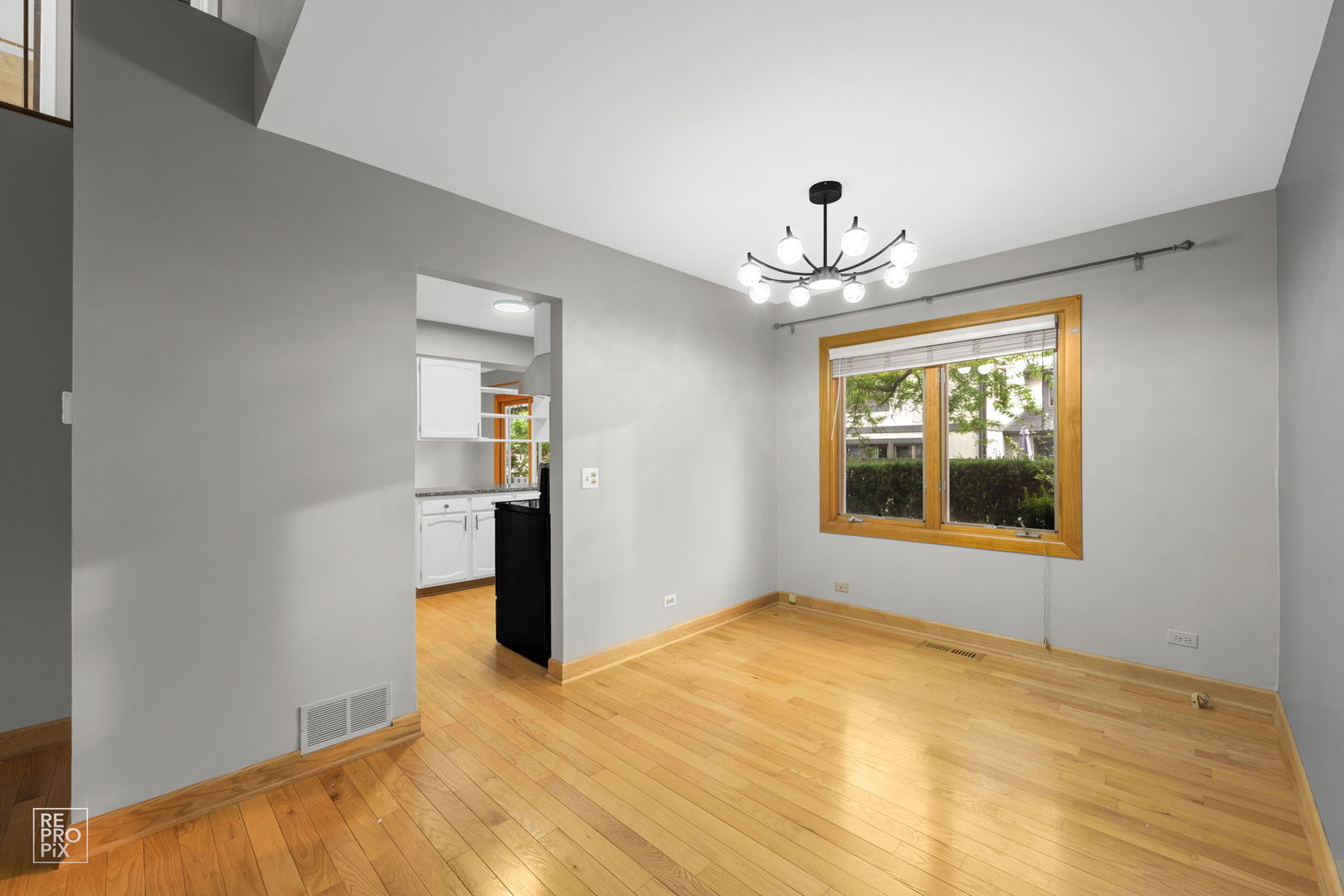 2627 Smith Street Rolling Meadows, IL 60008 - Photo 6 of 23 a view of an empty room with a window
