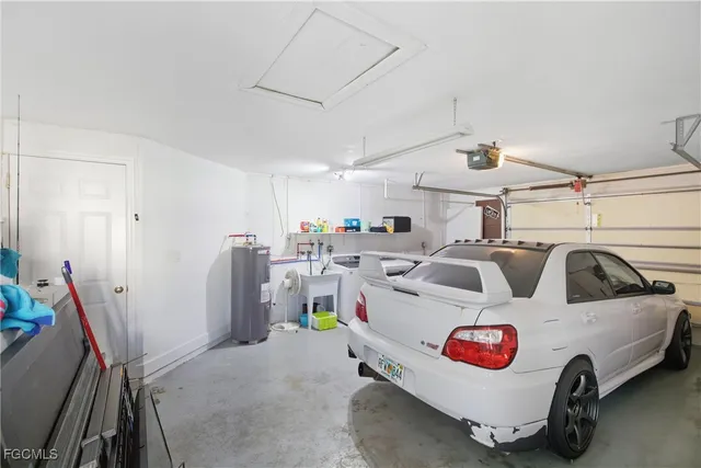 a view of a porch with furniture and garden