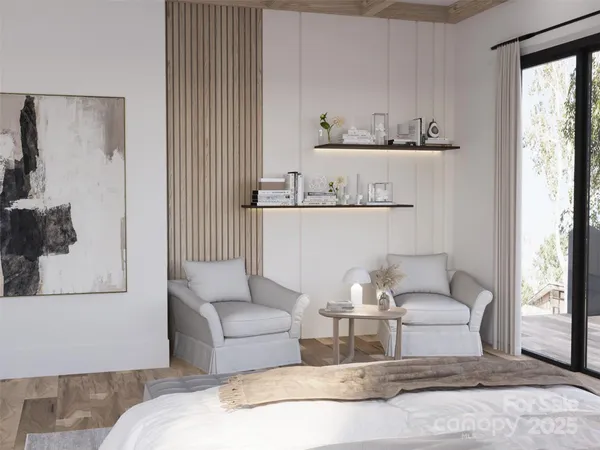 a bedroom with bed and a large window