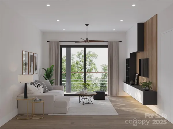 a living room with furniture and a window