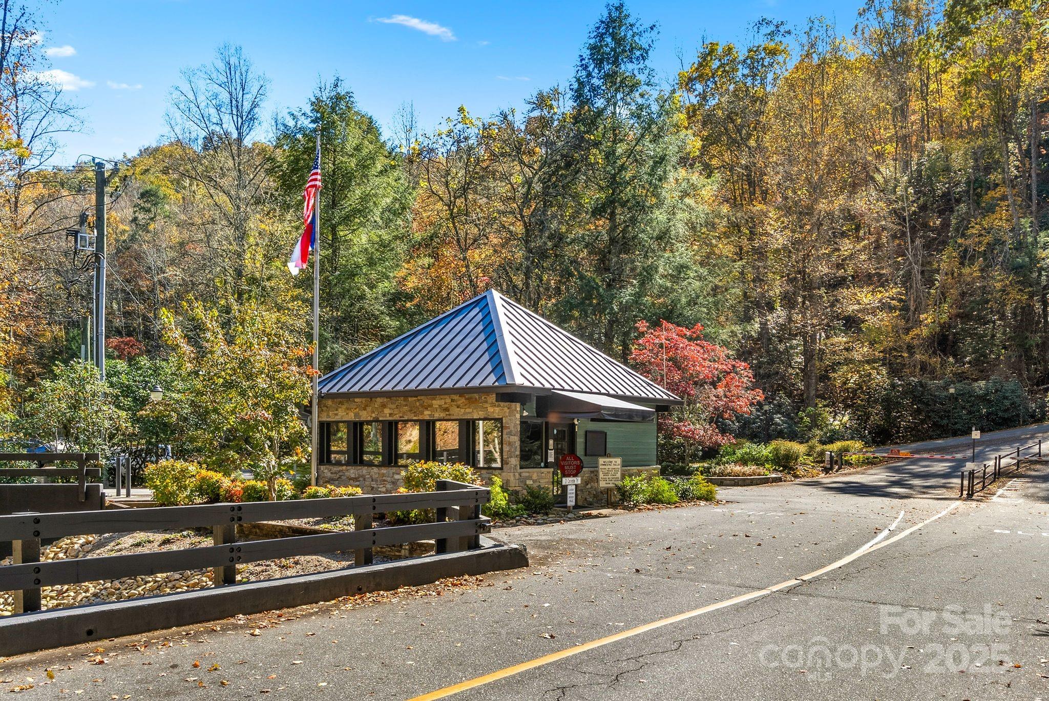 Tbd Connestee Trail Brevard, NC 28712 - Photo 23 of 48 a front view of a house with a garden
