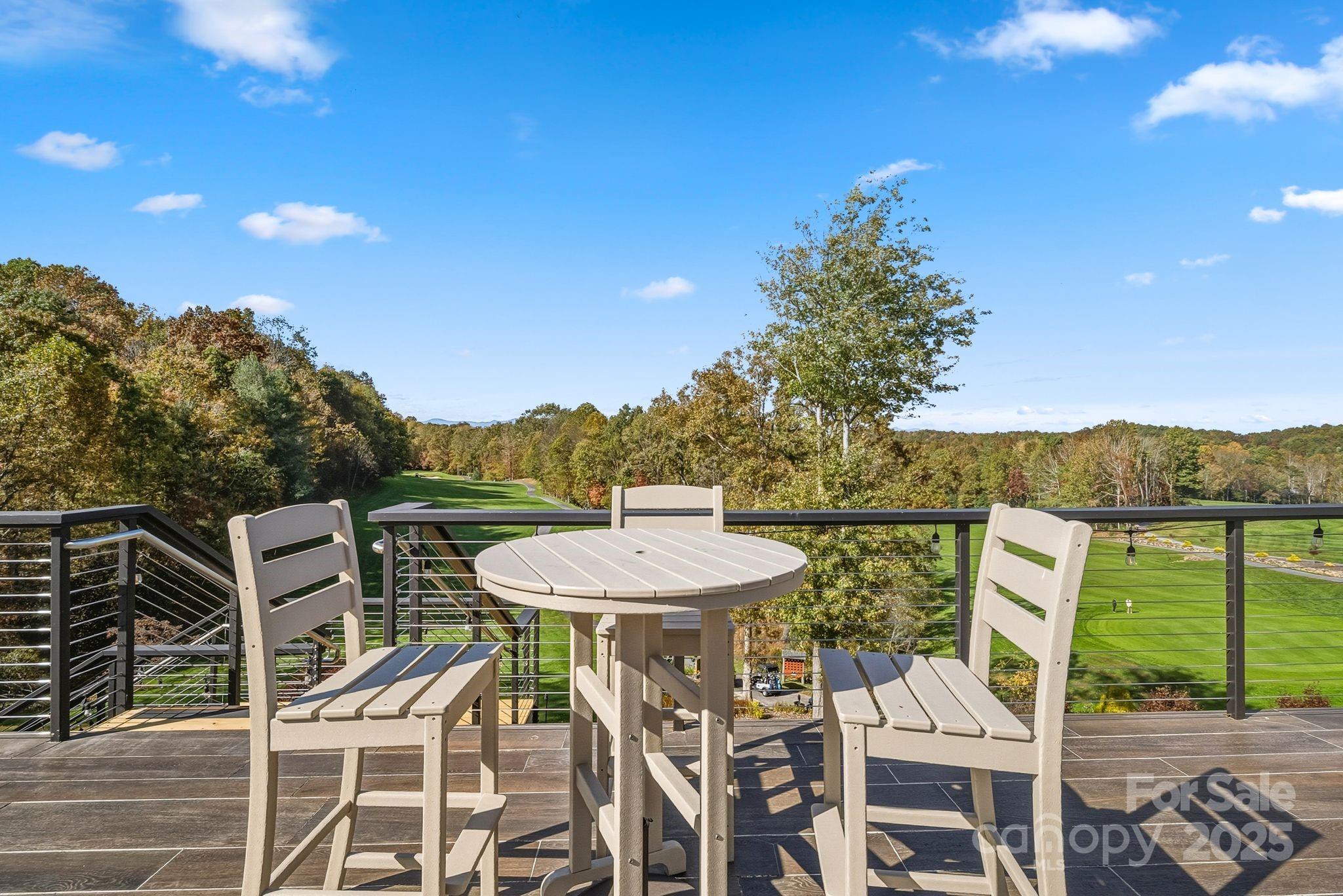 Tbd Connestee Trail Brevard, NC 28712 - Photo 35 of 48 a view of a chairs and table in the patio