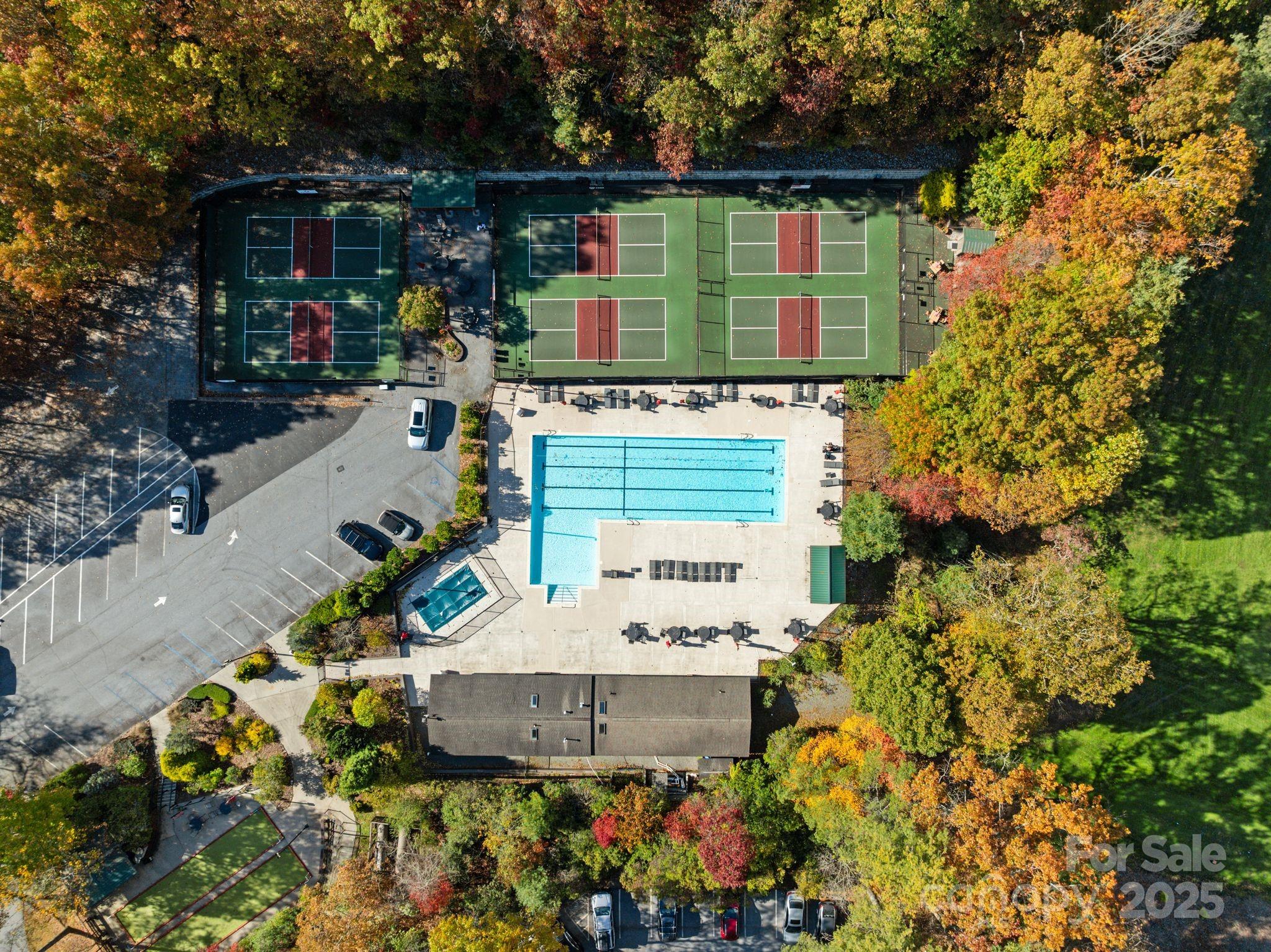 Tbd Connestee Trail Brevard, NC 28712 - Photo 41 of 48 an aerial view of a house with a garden and lake view