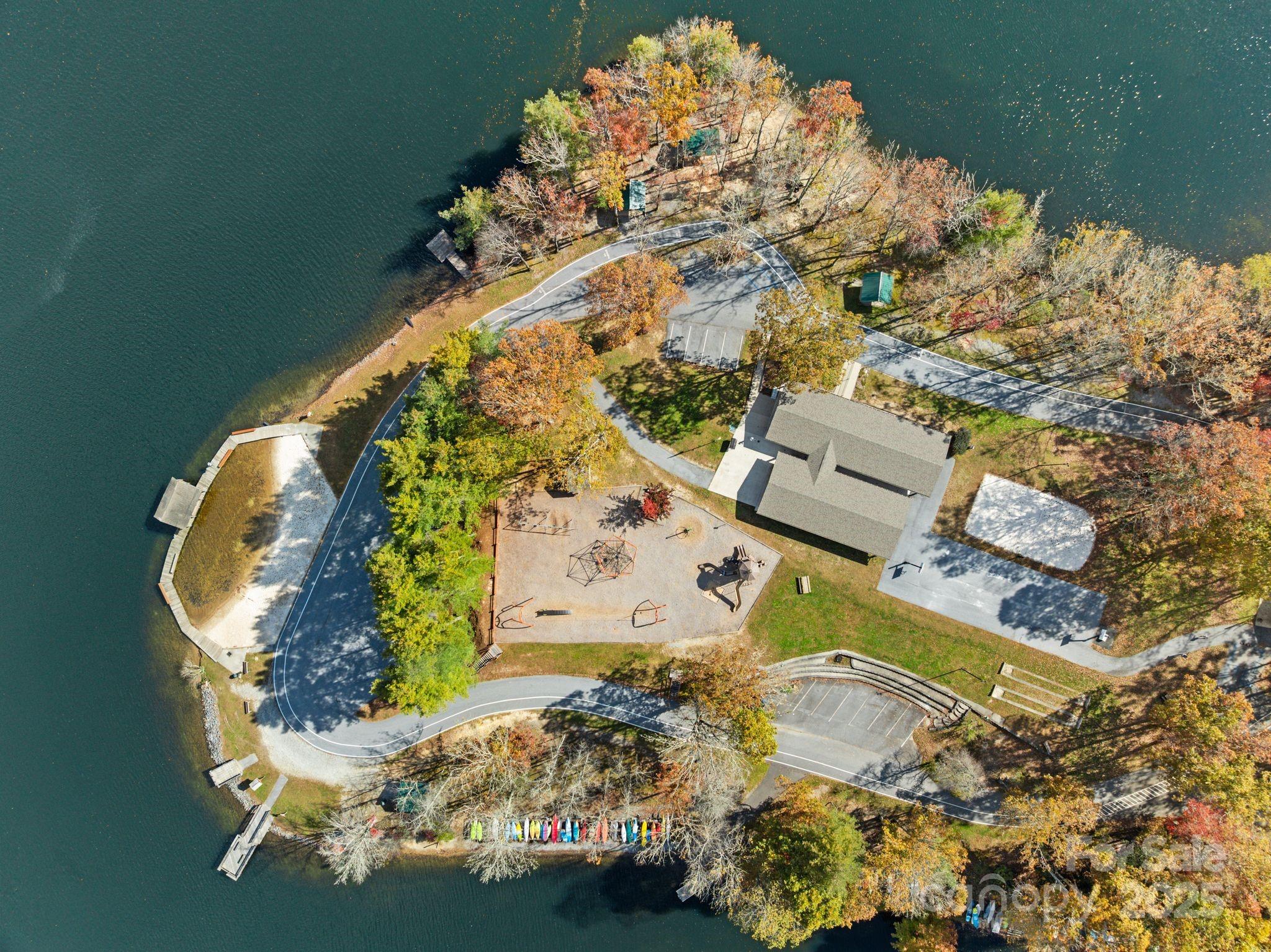 Tbd Connestee Trail Brevard, NC 28712 - Photo 42 of 48 an aerial view of a house with a swimming pool