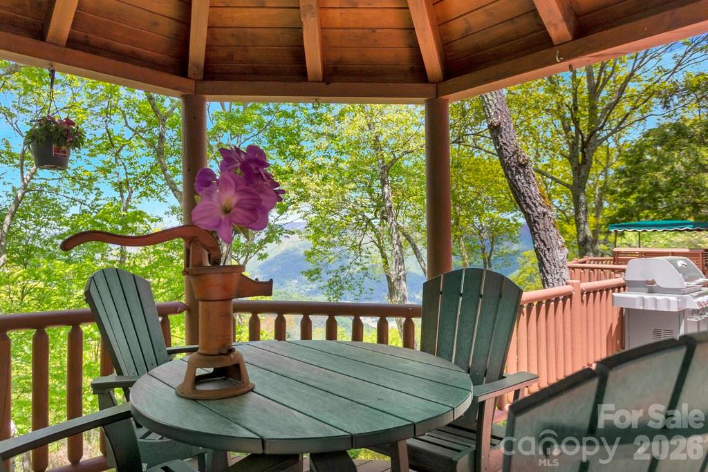 35 Falcon Crest Loop Maggie Valley, NC 28751 - Photo 39 of 46 a view of balcony with a table and chairs