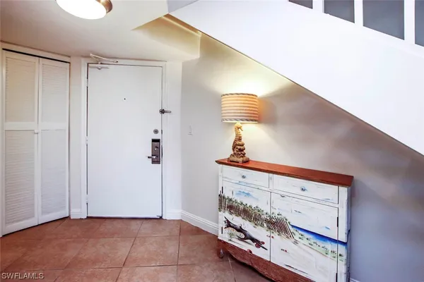 a kitchen with stainless steel appliances granite countertop a sink refrigerator and stove