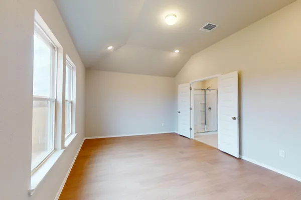 an empty room with windows