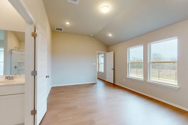 a view of an empty room with a window