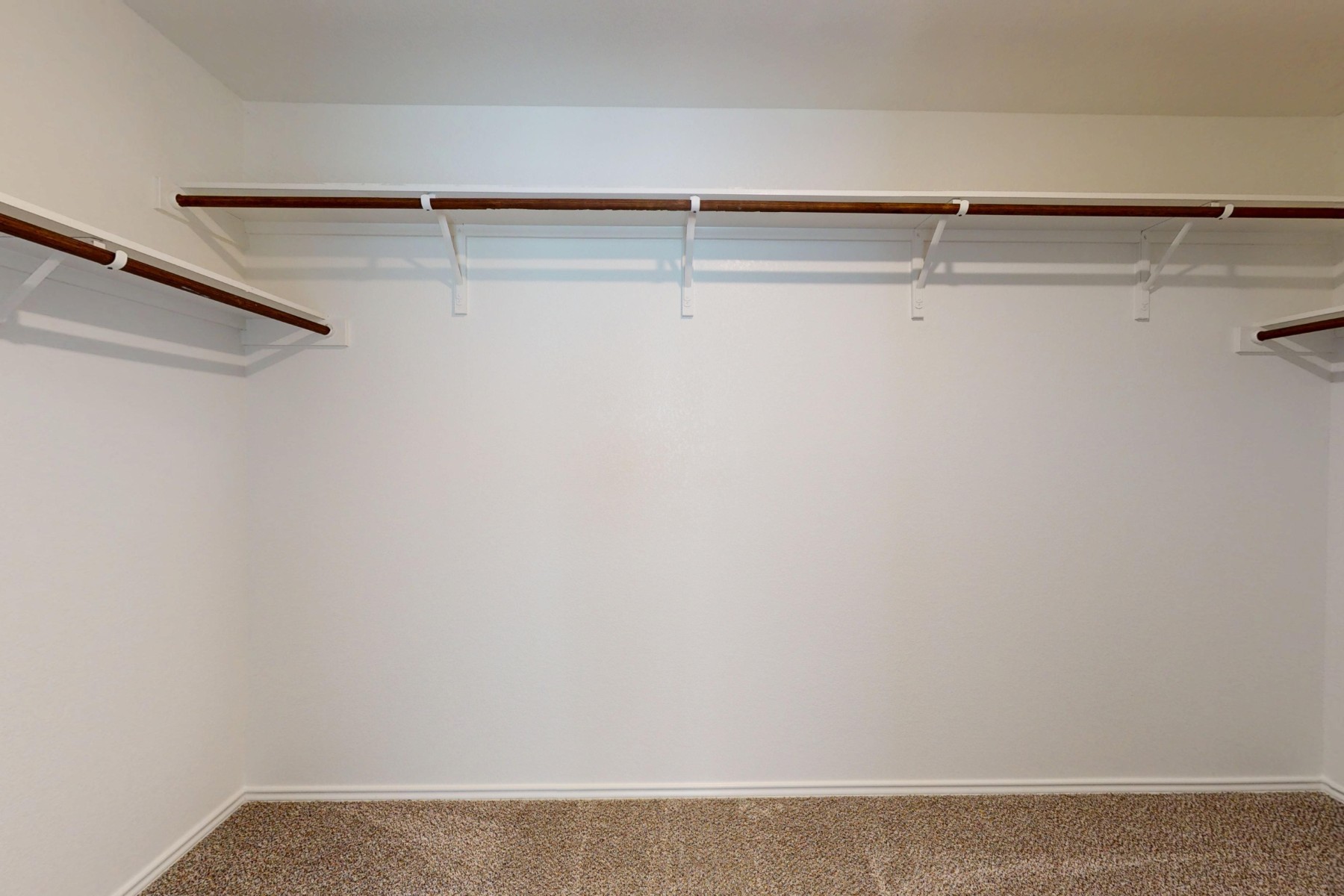 19917 Schatz Way Manor, TX 78653 - Photo 18 of 33 a close up view of racks on the wall